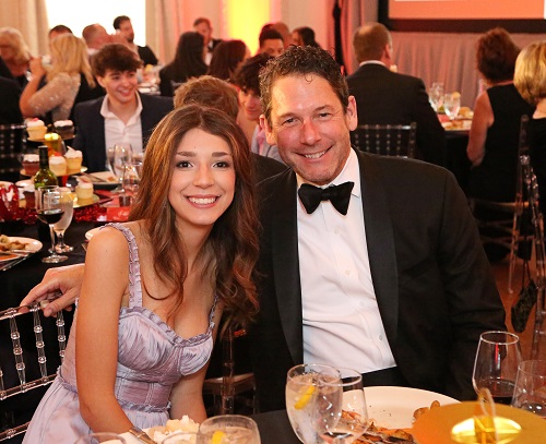 Smiling couple at their table